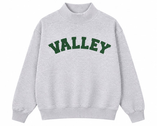 Gray sweatshirt with 'VALLEY' printed in green on a white background